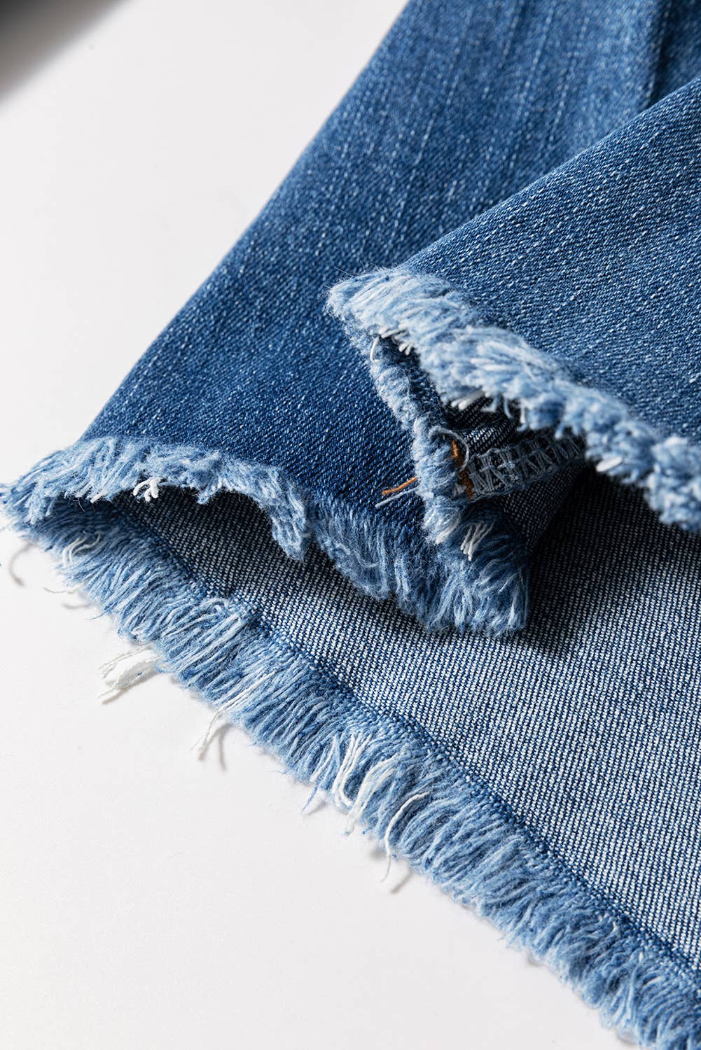 66Western High Waist Button Fly Seamed Raw Hem Flare Jeans